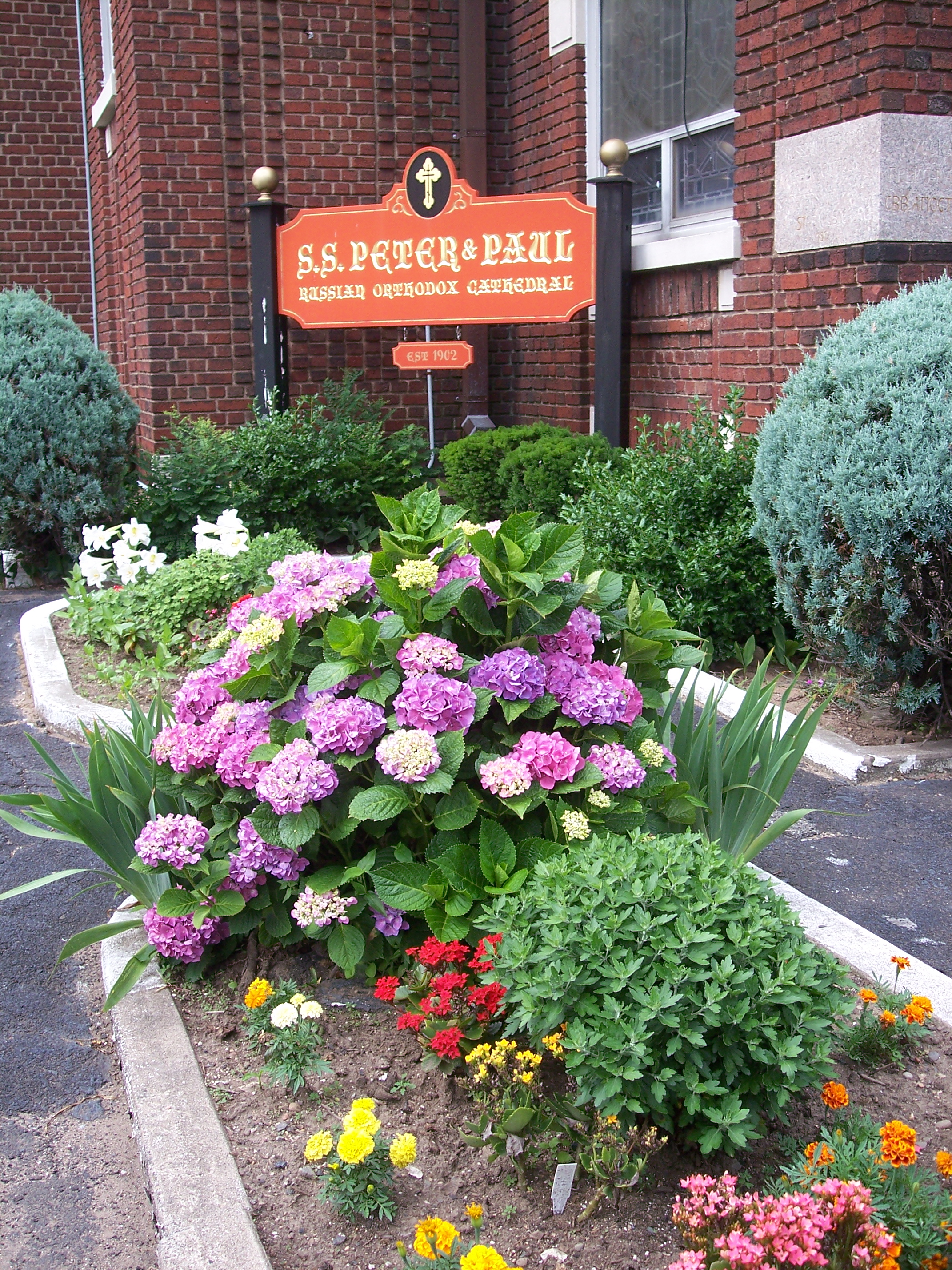 SS_Peter_and_Paul_sign_flowers.JPG